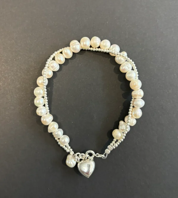 Pulseras cruzada con perlas